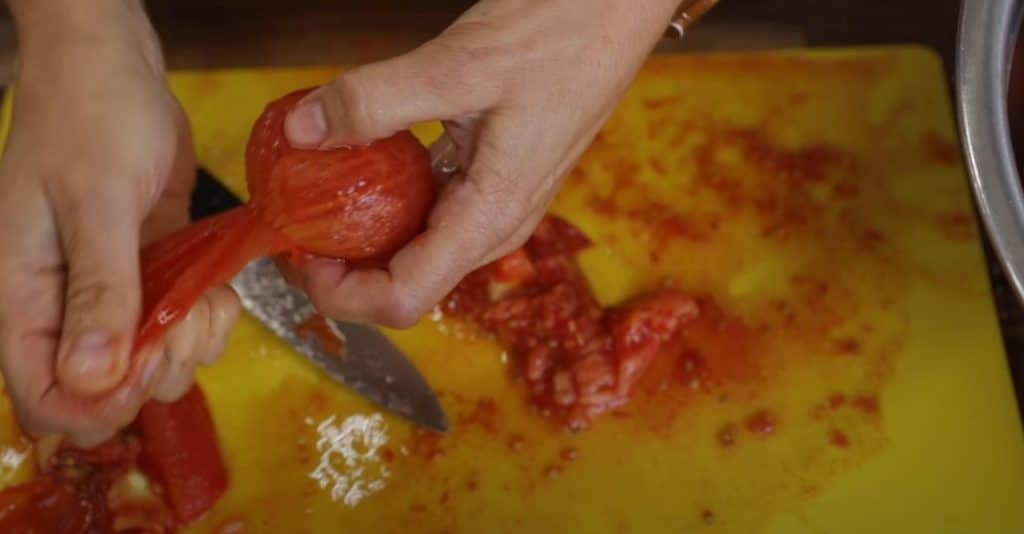 Peeling The Tomatoes And Preparing Kitchen Utensils