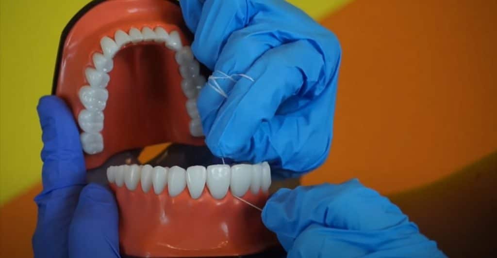 Hur använder man tandtråd?